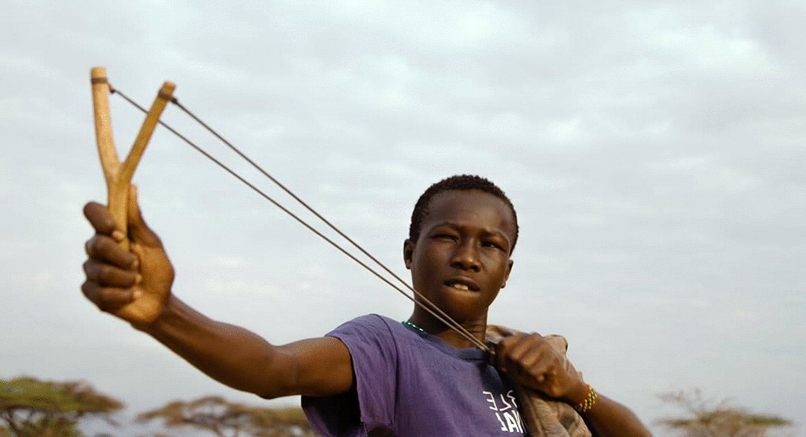 Photo from the movie Between the Rains